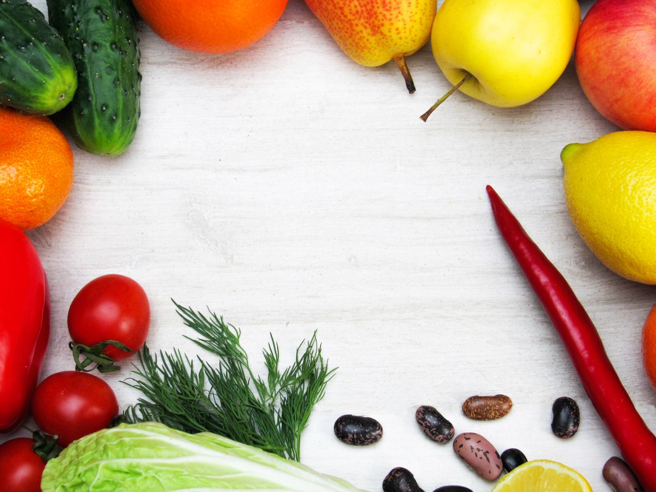 services-06 A vibrant flat lay of fresh fruits and vegetables with ample copy space on a white background.